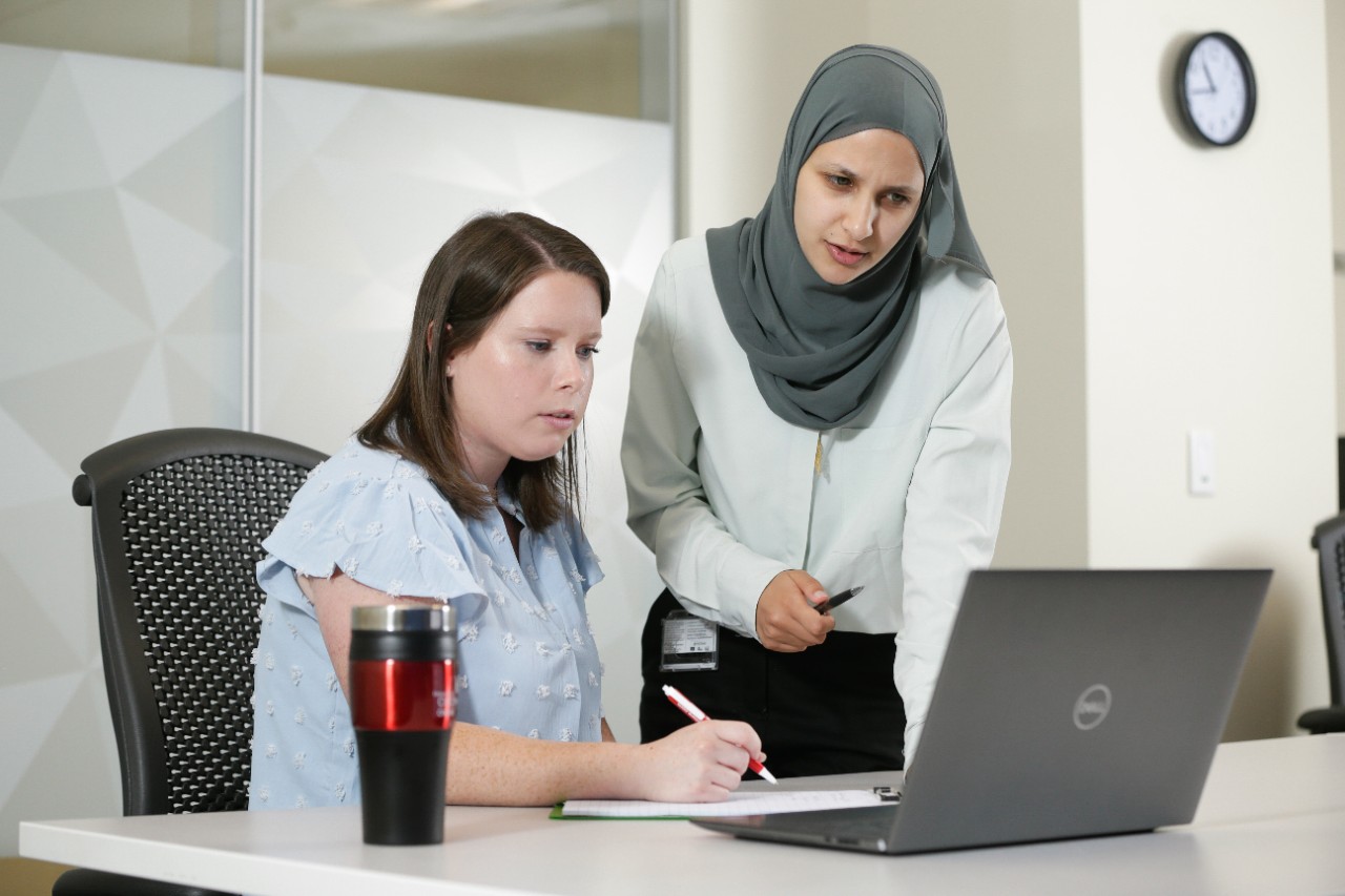 Staff pose for UC Online Bachelor of Arts in Organizational Leadership marketing